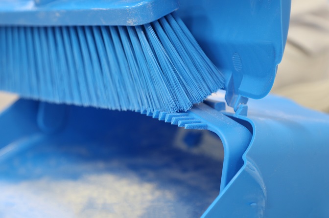 comb to clean bristles